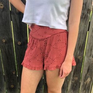 American Eagle orange flowy, lace shorts